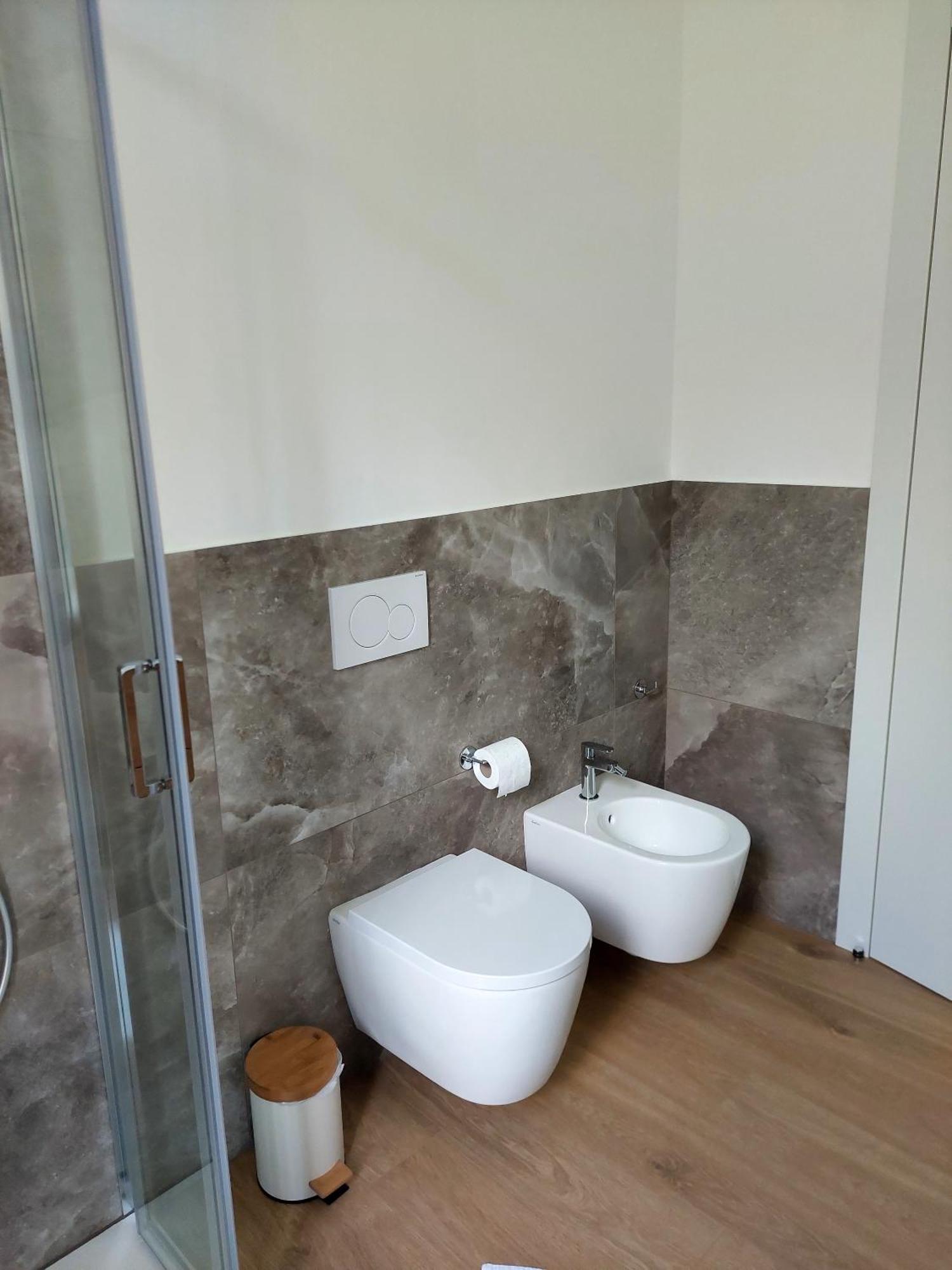 Casa Corso Matteotti 16 Apartment Леко Екстериор снимка