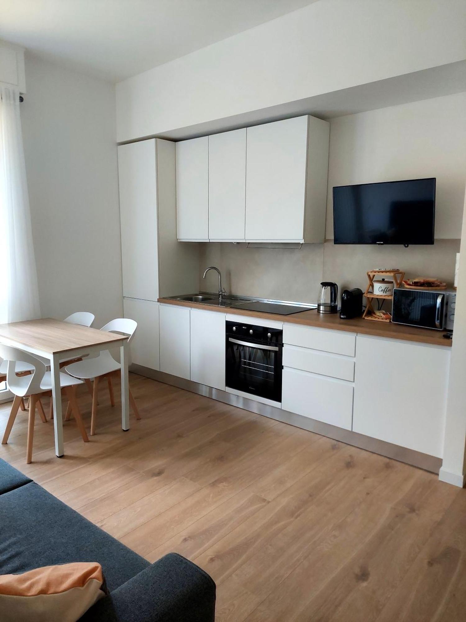 Casa Corso Matteotti 16 Apartment Леко Екстериор снимка